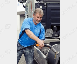 Truck refuelling with LPG (L.P. Gas, Autogas) Truck refuelling with LPG (L.P. Gas, Autogas)